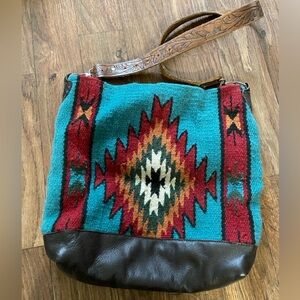 Aztec bag with tooled strap